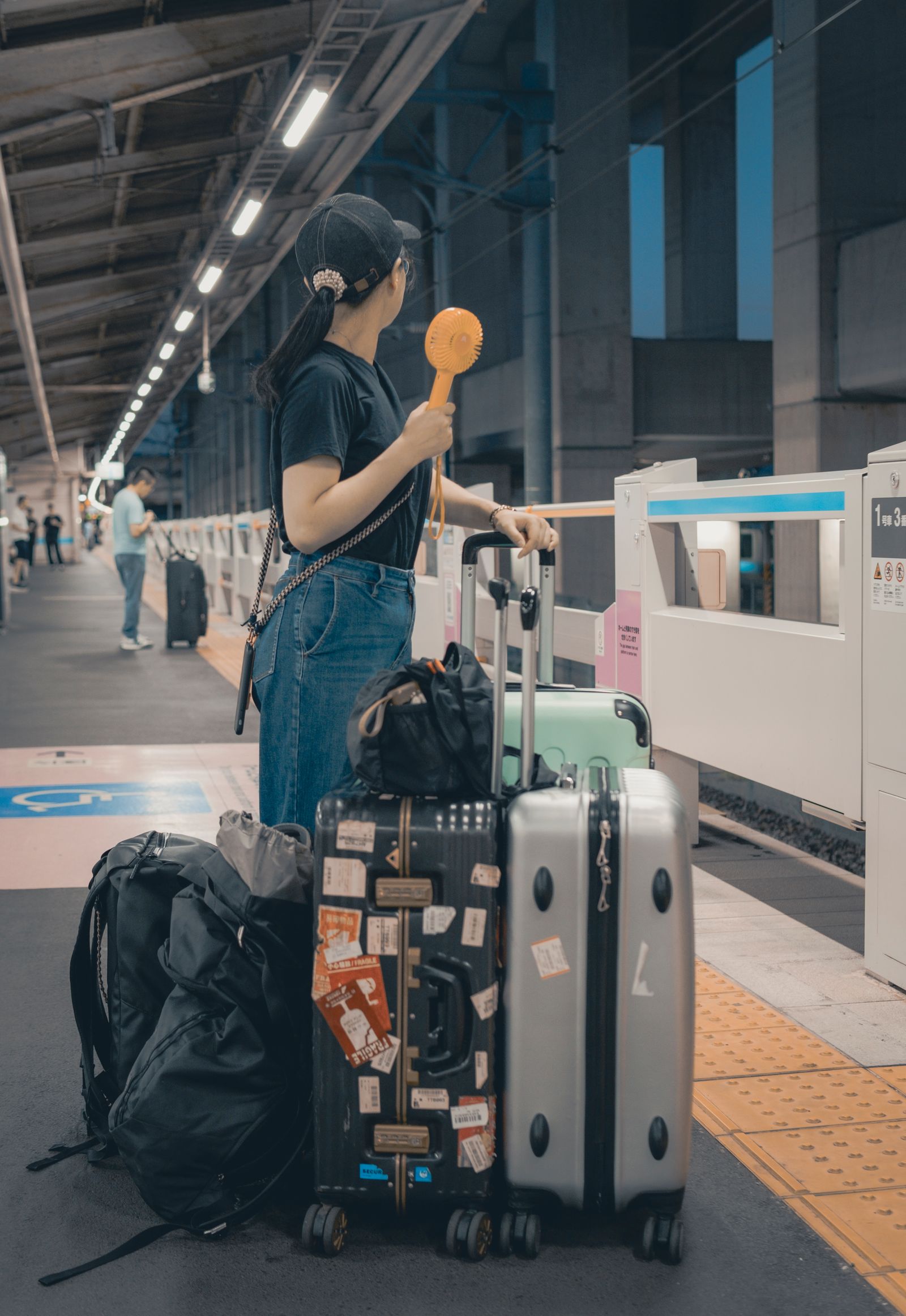 Traveler with luggage at Tokyo train station